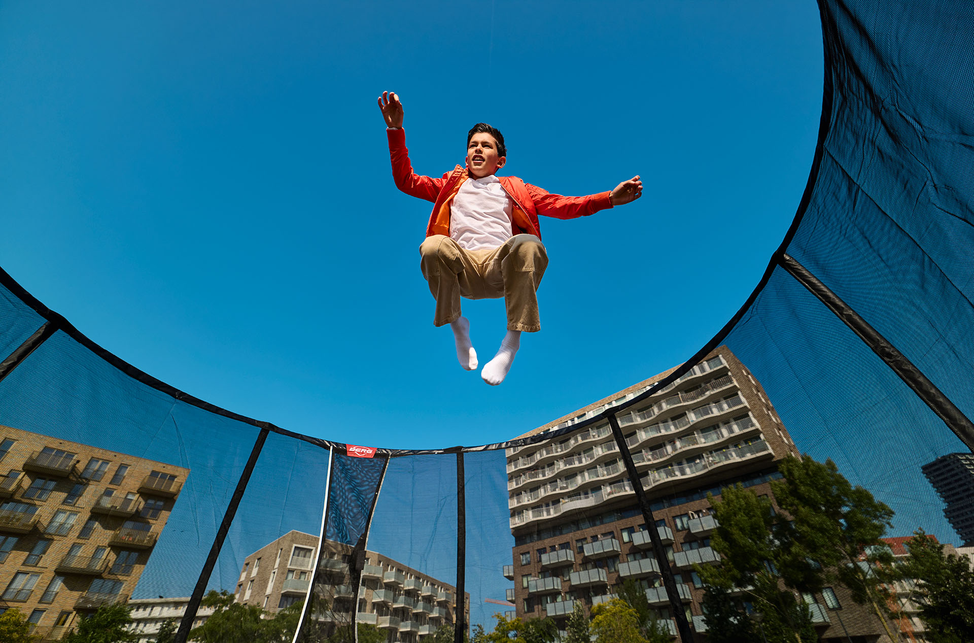 A BERG trampoline in a family garden